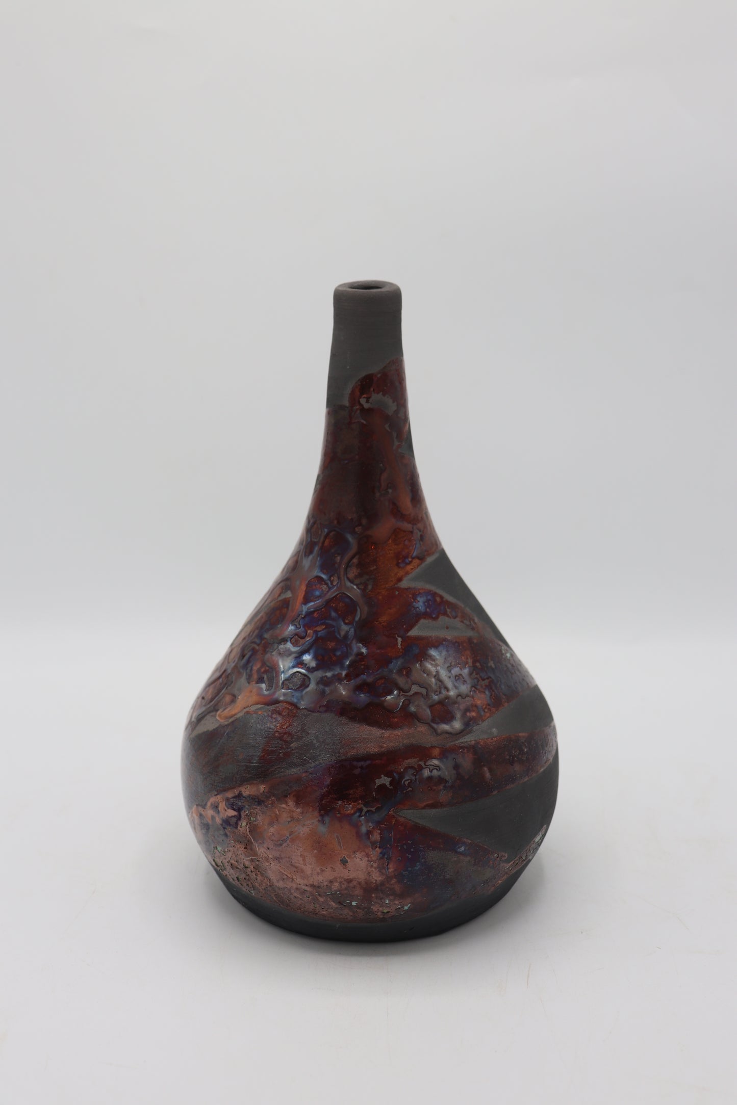 Raku vase made from white Raku Clay and copper Raku Glaze