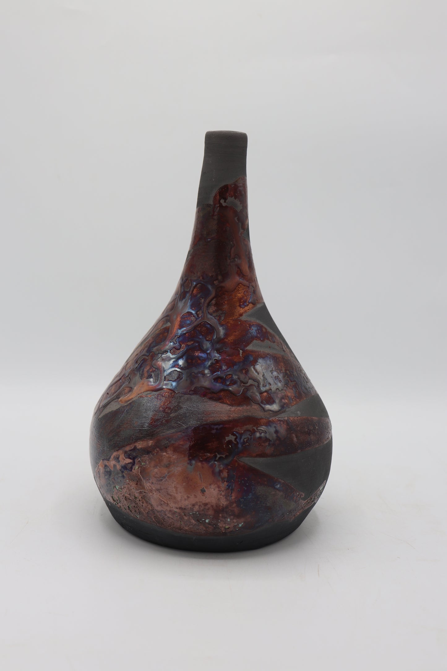Raku vase made from white Raku Clay and copper Raku Glaze