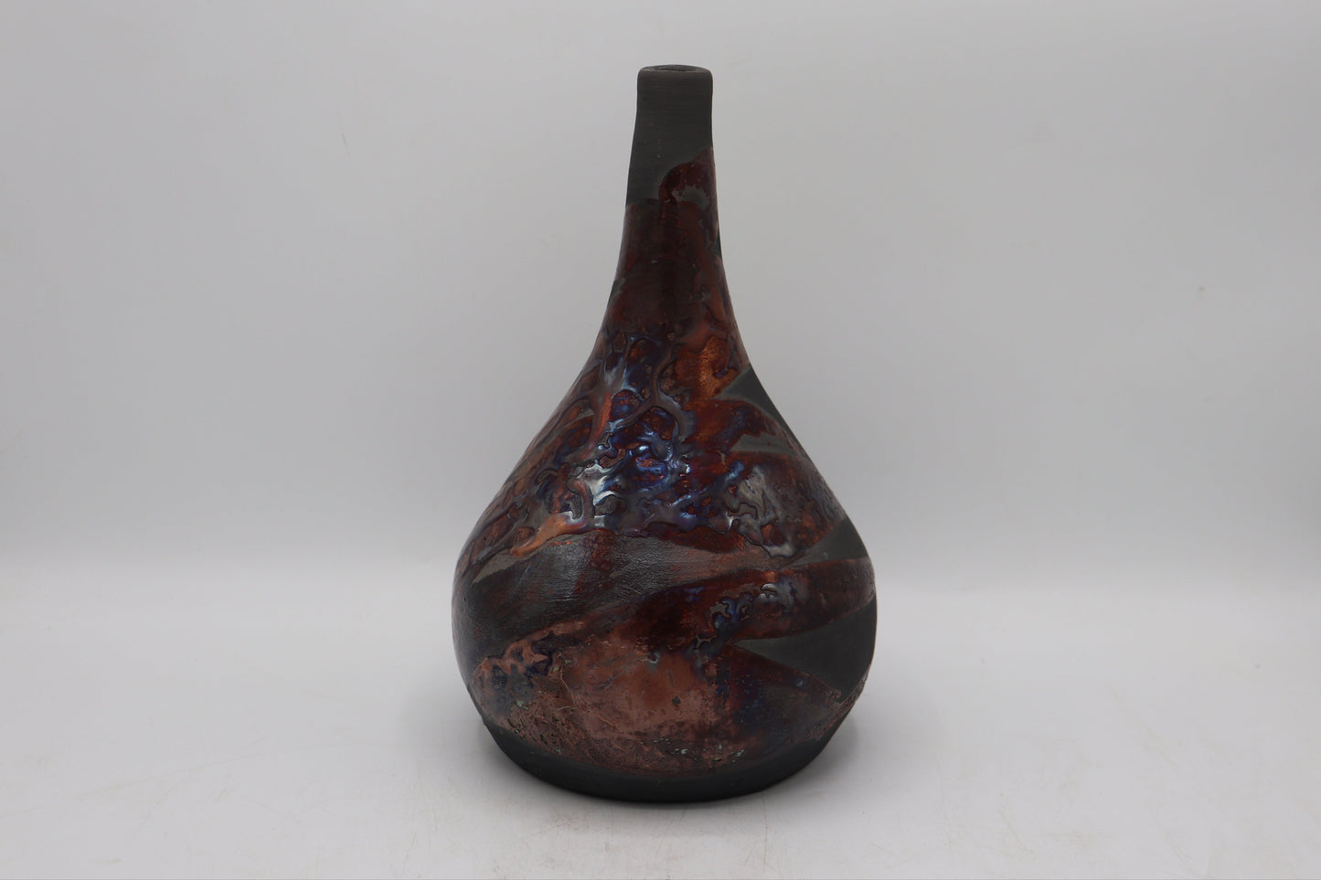 Raku vase made from white Raku Clay and copper Raku Glaze