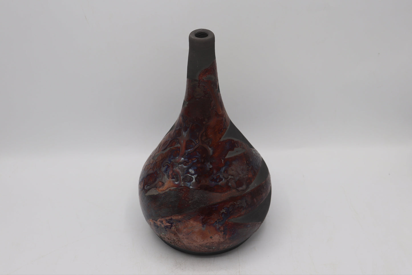 Raku vase made from white Raku Clay and copper Raku Glaze