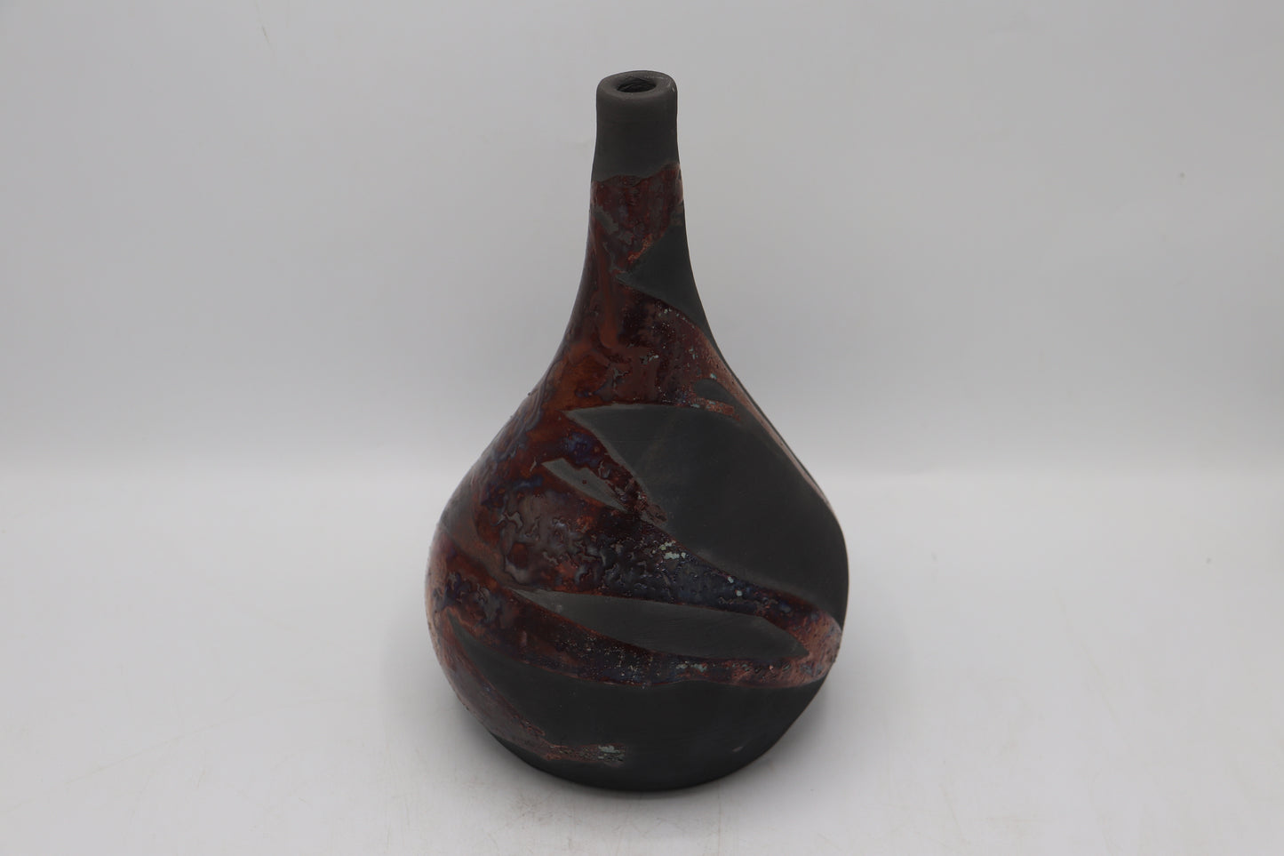 Raku vase made from white Raku Clay and copper Raku Glaze