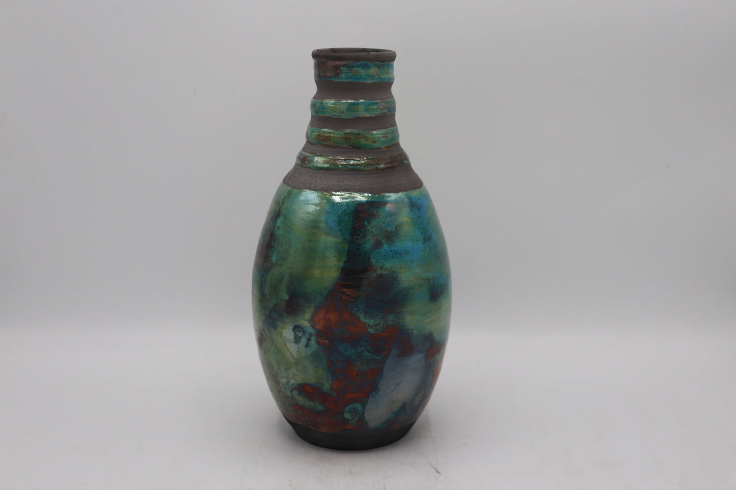 Raku vase made from white Raku Clay and turquoise Raku Glaze