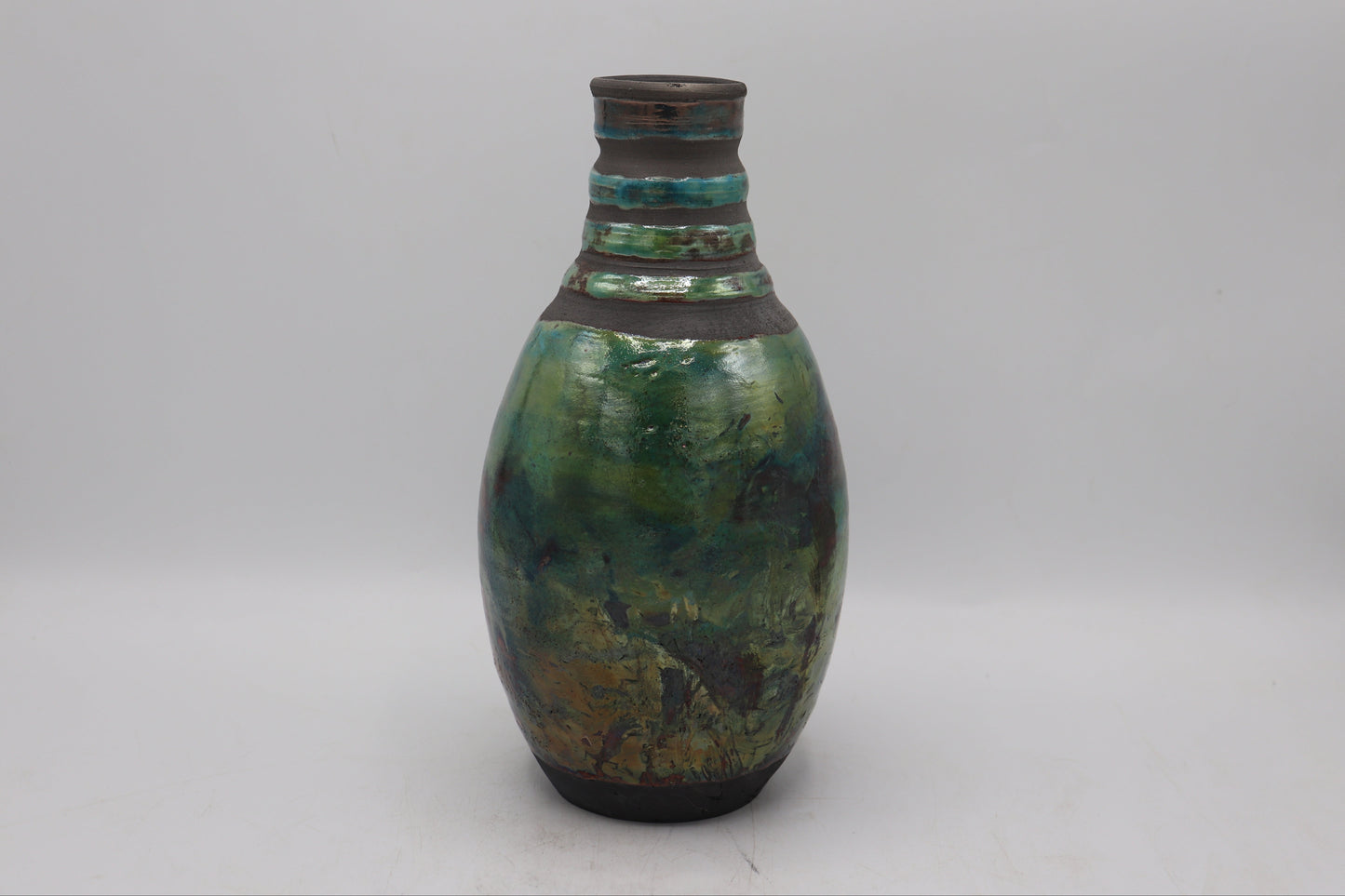 Raku vase made from white Raku Clay and turquoise Raku Glaze