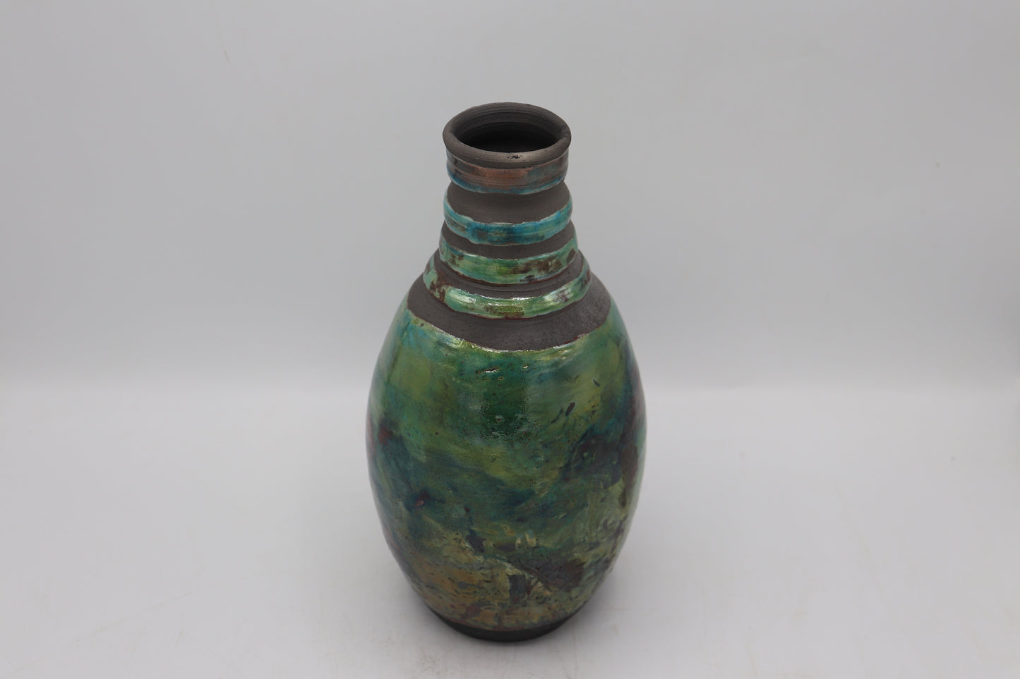 Raku vase made from white Raku Clay and turquoise Raku Glaze