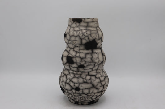 Raku vase made from white Raku clay and fired in Naked Raku firing technique