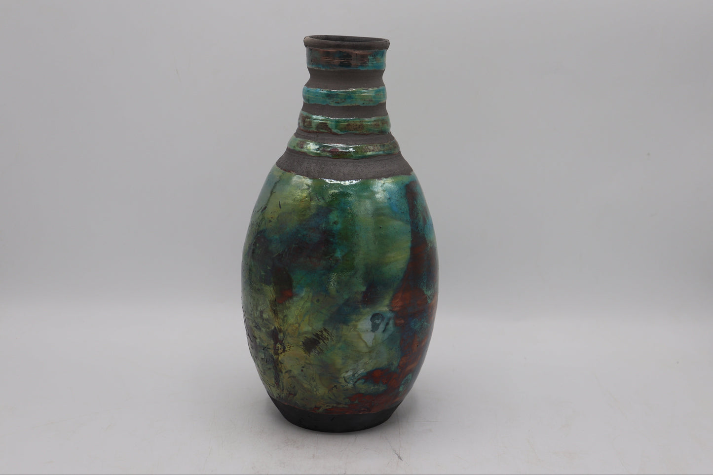 Raku vase made from  white Raku Clay and turquoise Raku Glaze