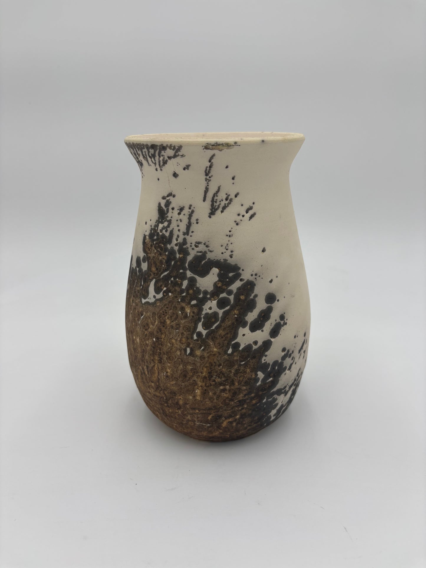 Raku vase made from white Raku clay and fired in Obvara firing technique